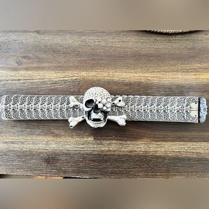Stretchable metal & rhinestone skull belt.